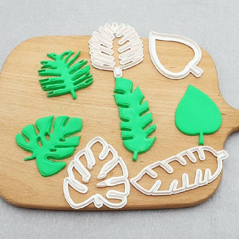Palm tree, turtle, and leaf-shaped cookie cutters and fondant molds for cake decorating and sugarcraft projects.