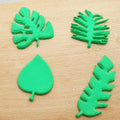 Palm tree and turtle leaf-shaped cookie cutter and fondant mold for cake decorating, suitable for baby and kids pretend play.