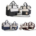 Set of five black travel nappy bags from Everything Baby, including shoulder tote and changing organiser bags for baby care.