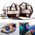 Set of five black travel nappy bags from Everything Baby, including shoulder tote and changing organiser for baby care.