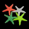 Colorful glow-in-the-dark pebbles, 100-piece set from Everything Baby, for fish tanks, gardens, or outdoor play.