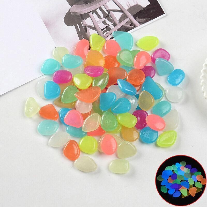 Colorful glow-in-the-dark pebbles stones for fish tanks, gardens, or outdoor play, 100-piece set by Everything Baby.