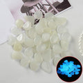 Colorful glow-in-the-dark pebbles for fish tanks, gardens, and outdoor play, includes 100 mixed-colored stones from Everything Baby.