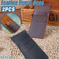 Two vintage handmade genuine leather pencil cases by Everything Baby, cowhide protective holders for kids' pens and pencils.