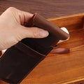 Two vintage handmade genuine leather pencil cases with cowhide texture, designed for kids and baby accessories.