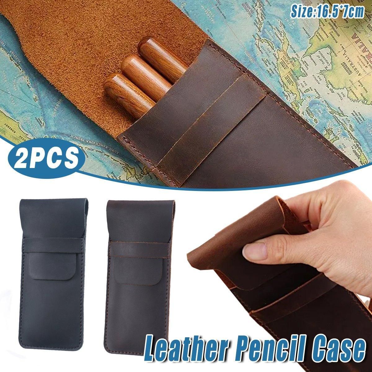Two vintage handmade genuine leather pencil cases with cowhide finish, designed for kids' stationery storage.