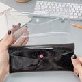 Seven colorful transparent pencil cases with buckles, portable storage bags for kids and baby stationery organization.