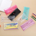 Seven colorful transparent pencil cases with buckles, portable storage bags for kids, ideal for pens and small school supplies.