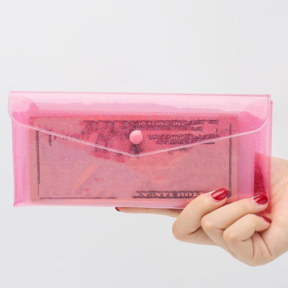 Seven-pack transparent colorful pencil cases by Everything Baby, portable storage bags with buckles for kids' stationery organization.