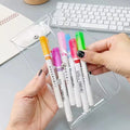 Seven colorful transparent pencil cases with buckles, portable storage bags for kids' pens and pencils, by Everything Baby.
