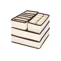 Foldable beige drawer organizer set for bras and underwear, perfect for kids' toy boxes and closet storage by Everything Baby.