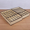 Four beige foldable drawer organizers for bras and underwear, designed for kid’s toy storage and closet organization.