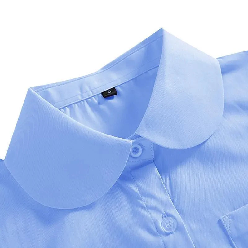 White girls' Peter Pan collar long sleeve school shirt with adjustable cuffs, by Everything Baby, for kids.