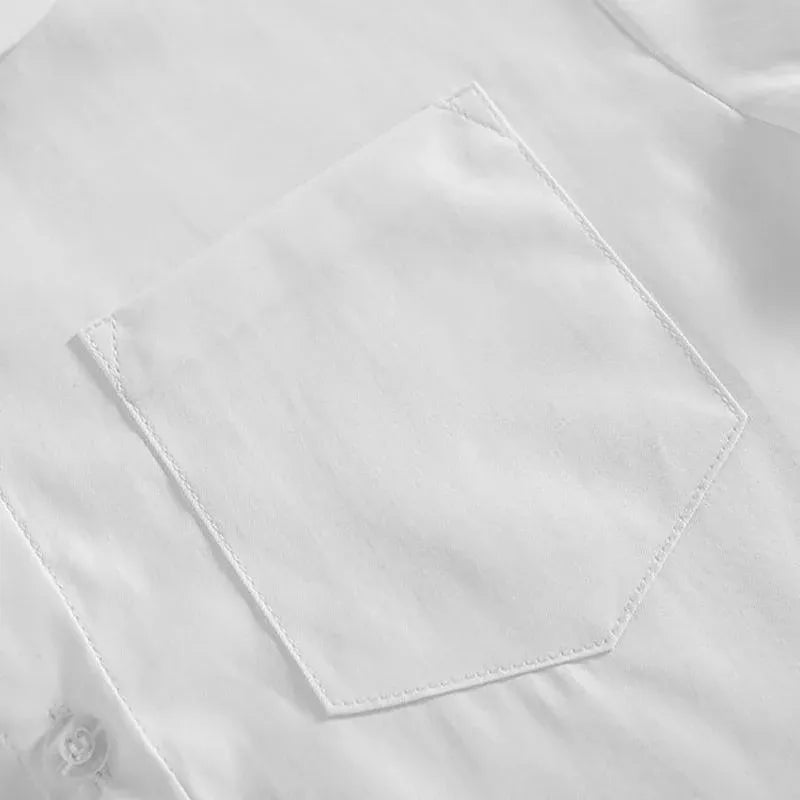 White girls' long sleeve school shirt with Peter Pan collar and adjustable cuffs, from Everything Baby, size M.