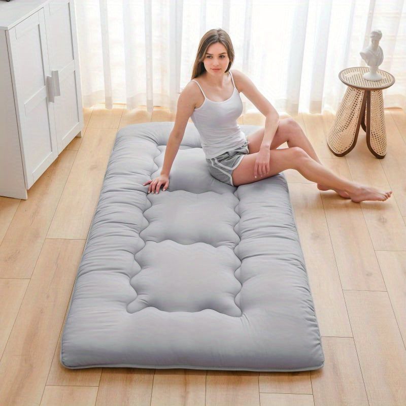 Foldable Tatami floor futon mattress pad by Everything Baby, suitable for kids' room seating or sleeping on the floor.