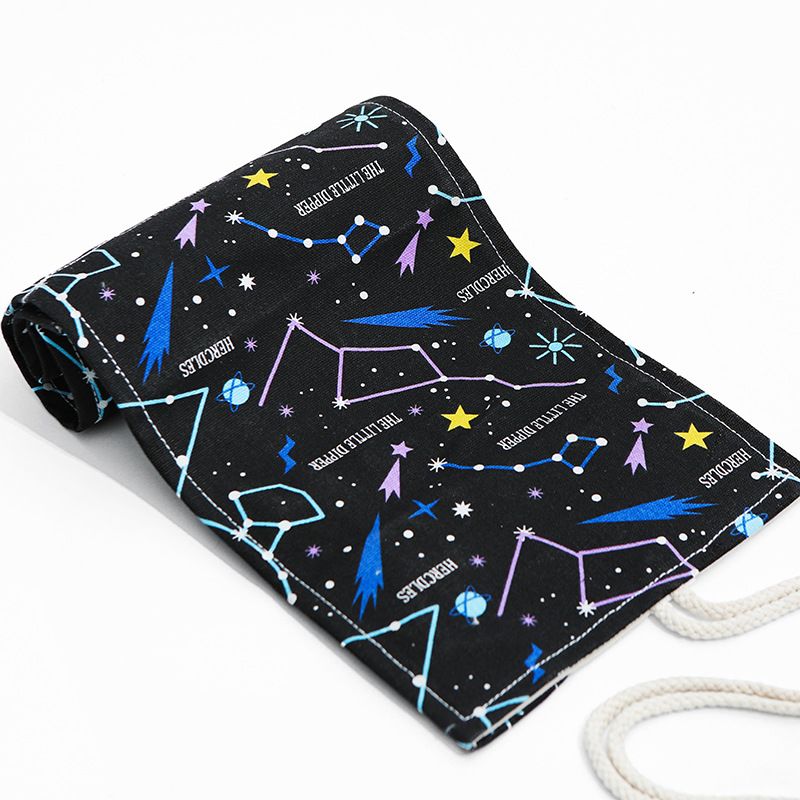 Starry Sky roll-up pencil case by Everything Baby with 36 slots, canvas design, portable tie closure for art supplies and drawing tools.