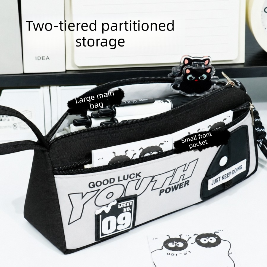 Large capacity double-zip pencil case by Everything Baby in black and gray with front pocket, wrist strap, and 3D patch for stationery storage.