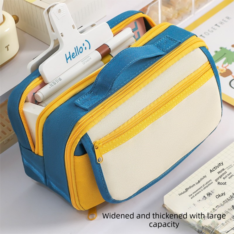 Yellow multi-layer pencil case with handle from Everything Baby, featuring multiple compartments and a magnetic front pocket.