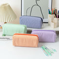 Large striped black and white fabric pencil case by Everything Baby, with smooth zipper, holds pens, pencils, and stationery.