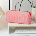 Large red and white striped pencil case by Everything Baby, fabric stationery pouch with smooth zipper for pens and pencils.