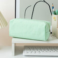 Large green and white striped pencil case by Everything Baby, fabric stationery pouch with smooth zipper for pens and pencils.