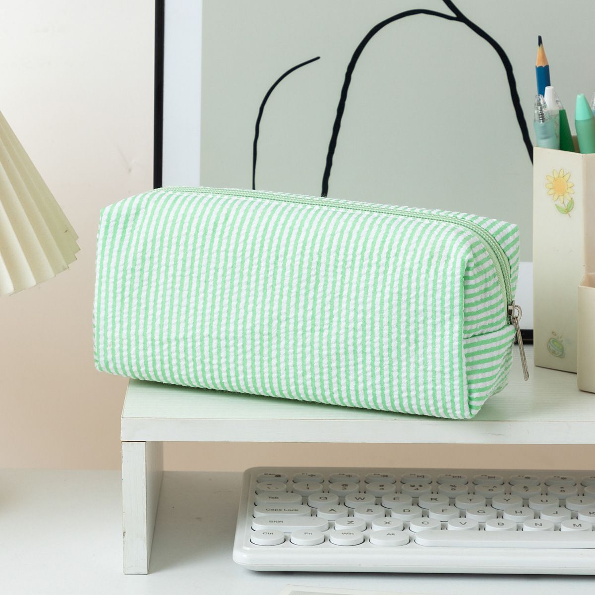 Large green and white striped pencil case by Everything Baby, fabric stationery pouch with smooth zipper for pens and pencils.