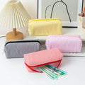Large green and white striped pencil case by Everything Baby with smooth zipper, ideal for pens, pencils, and stationery storage.