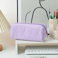 Large capacity striped purple and white fabric pencil case from Everything Baby, with smooth zipper for pens, pencils, and stationery.